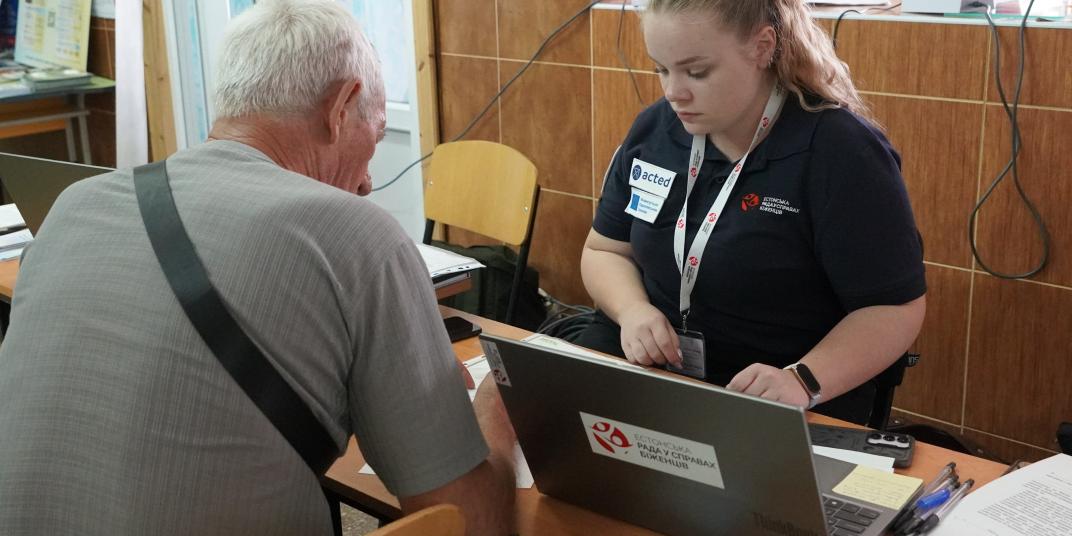 two people discussing