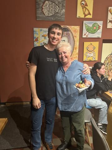 Young man and eldery woman